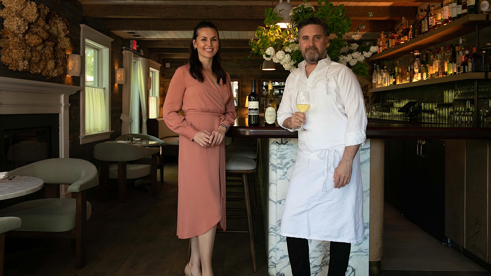 Amy Racine next to Chef John Fraser at North Fork Table and Inn on Long Island.